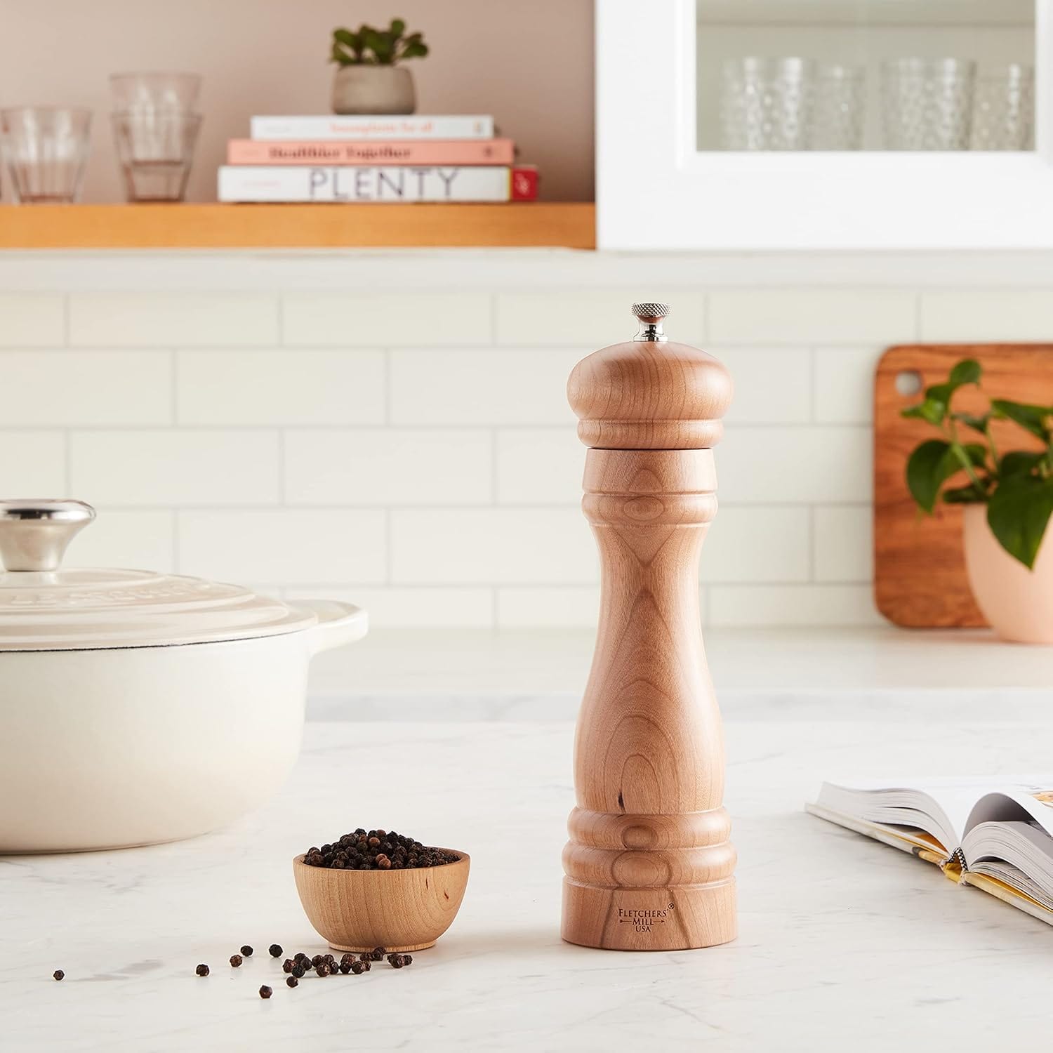 Fletchers Mill 8 Federal Pepper Mill in cherry wood with a silver knob sitting on a kitchen counter