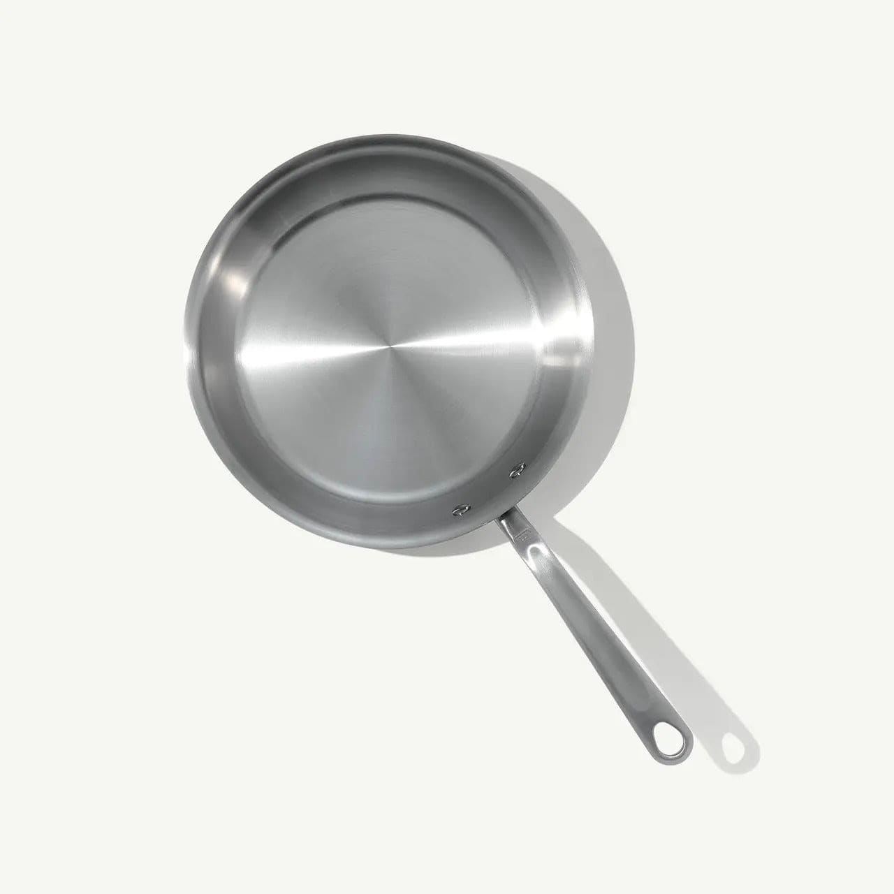 10 stainless steel frying pan polished finish with a handle extending to the right