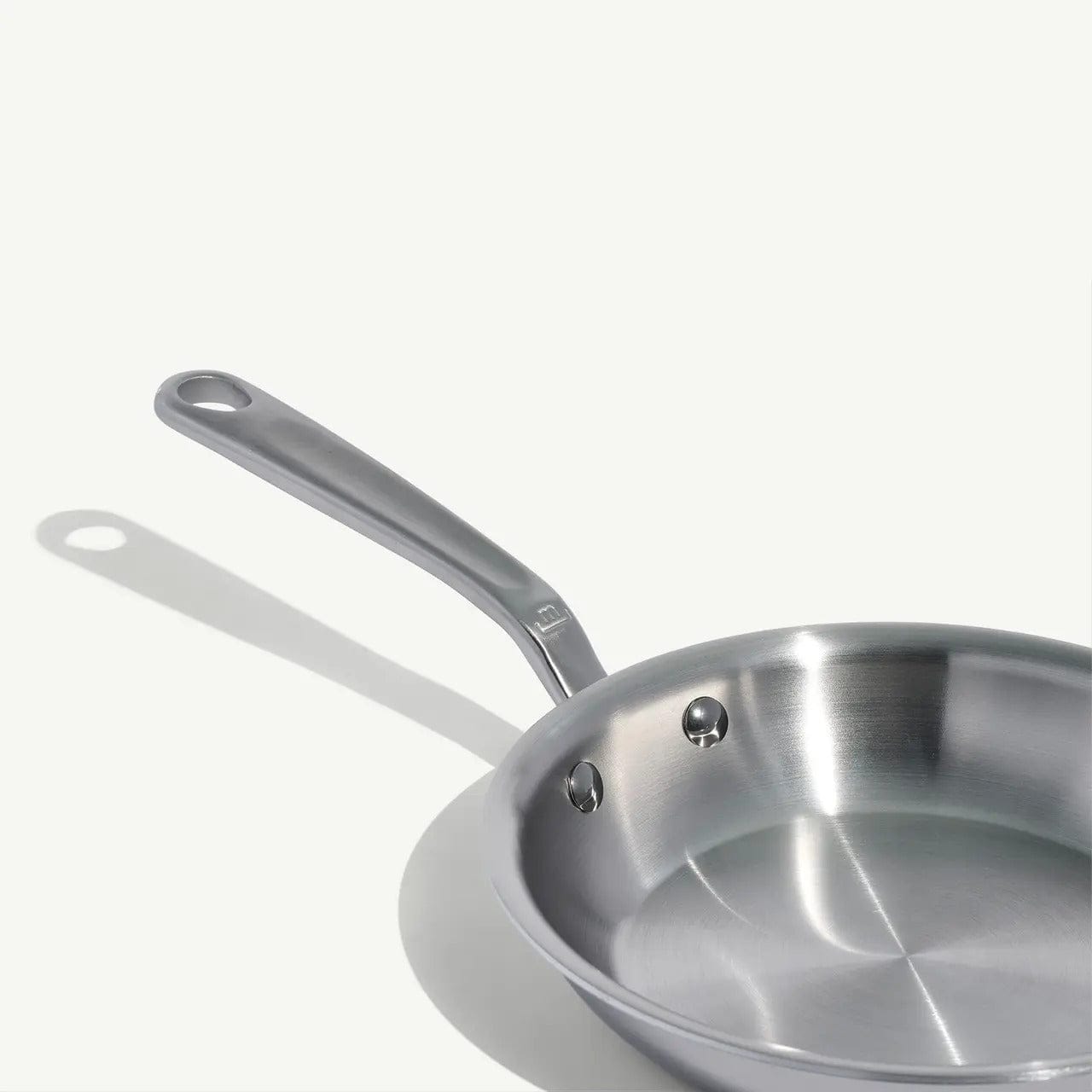 Stainless clad 8 frying pan with a long handle and polished finish