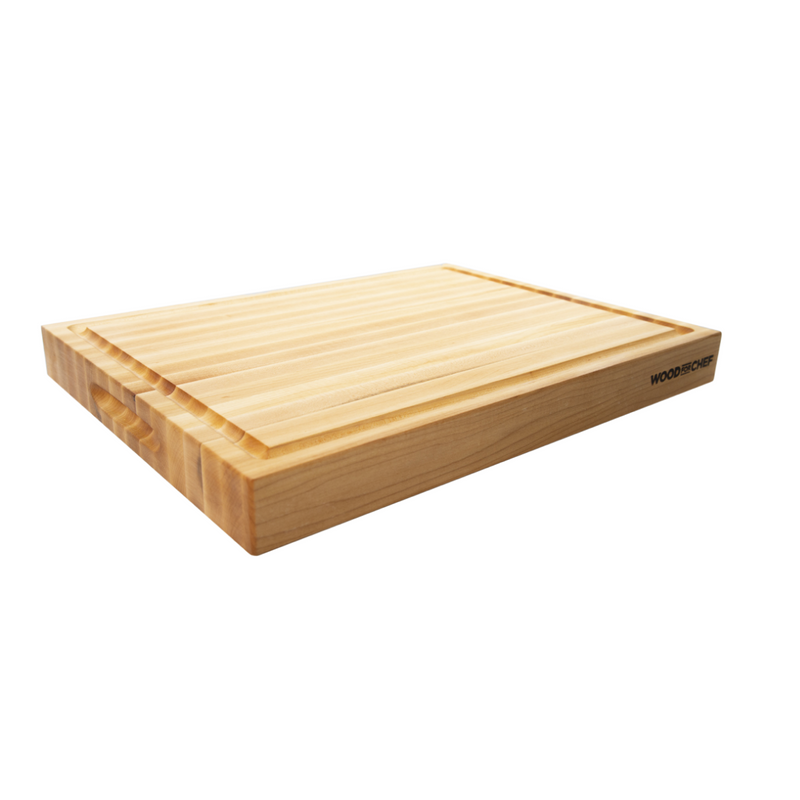 Light maple wood cutting board with parallel grooves and a cutout handle on the side