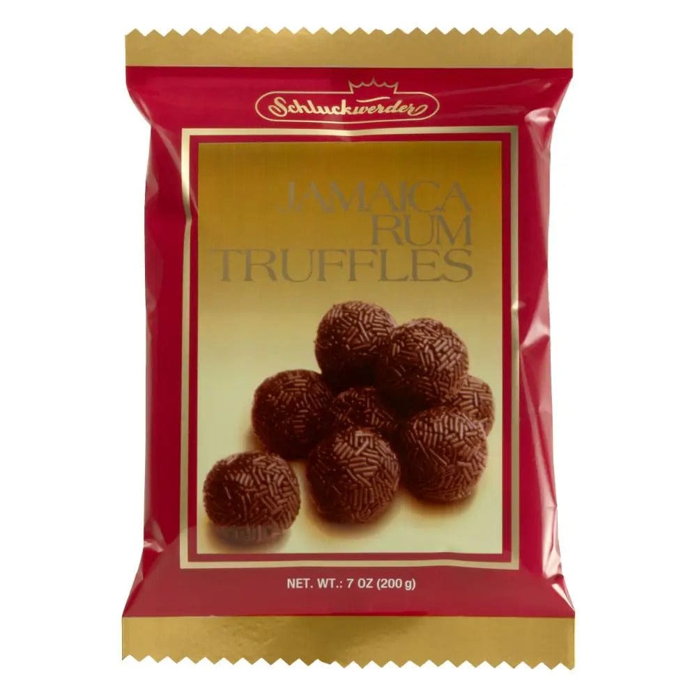 Red and gold bag of Jamaica Rum Truffles candy with a picture of chocolate truffles covered in sprinkles