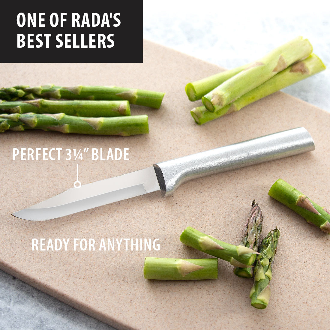 Kramer Stainless Steel Paring Knife sharp silver blade with a sleek silver handle on a light brown cutting board