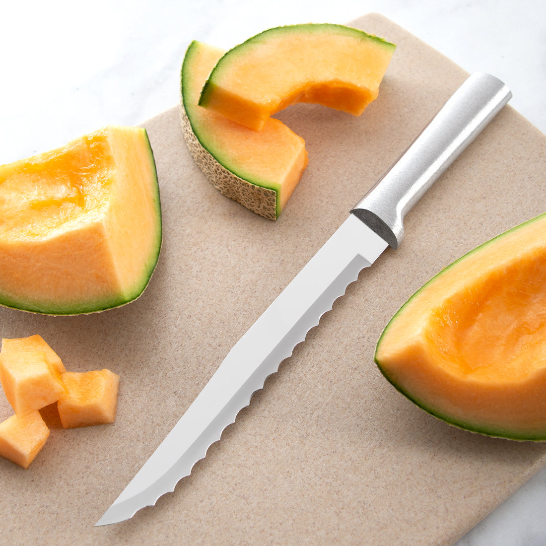Cuisinart Stainless Steel Serrated Utility Knife with silver handle perfect for slicing melons and other fruits