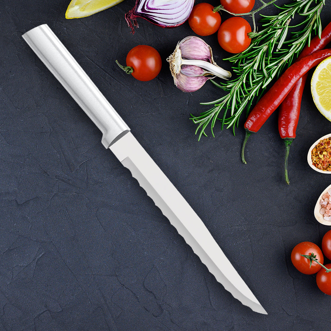 White plastic-handled serrated bread knife with a long sharp blade ideal for slicing bakery goods