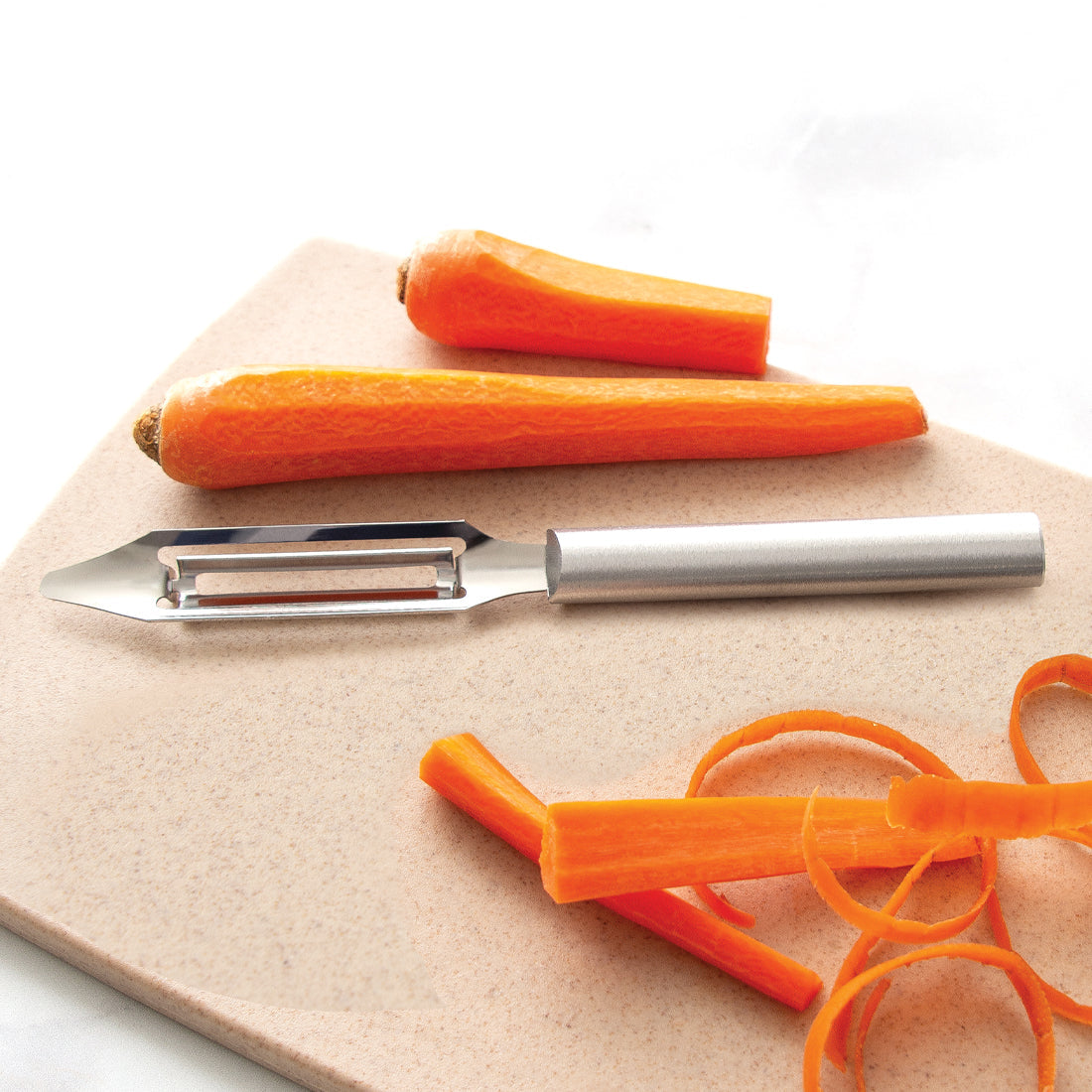 Stainless steel swivel peeler with brushed handle ideal for fruits and vegetables like carrots
