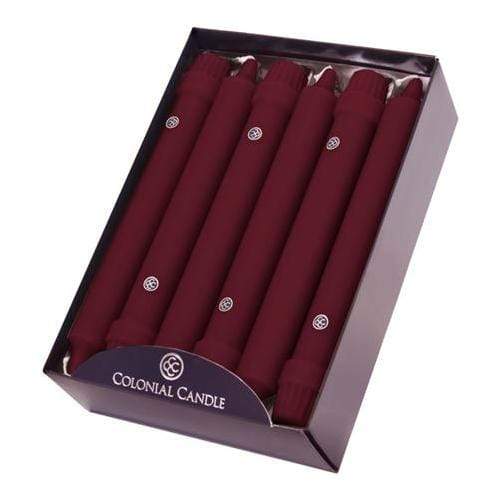 Box of six 8-inch cranberry Colonial Candle Classic Taper candles visible in dark packaging